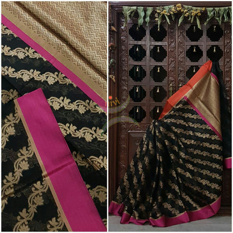Black silk cotton Benaras Brocade Supernet saree with satin finish contrasting pink orange border and antique woven antique gold zari all over the saree.