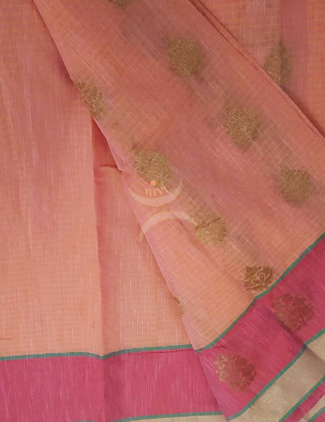 Pink shot Peach Silk Cotton Benaras Brocade saree with antique zari weaving all over the saree.