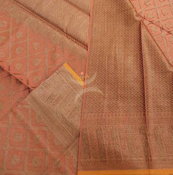 Peach Silk Cotton Benaras Brocade saree with woven Brocade border and antique woven gold zari all over the saree.