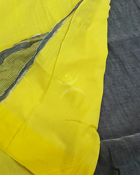 Grey Handloom 80s count Linen saree with contrasting yellow pallu and  border.
