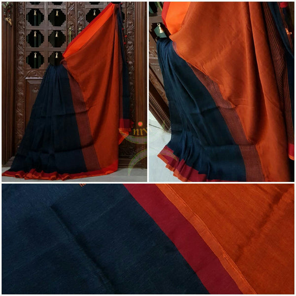 Dark Navy blue Handloom 80s count Linen saree with contrasting orange pallu and  border.