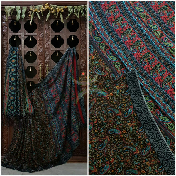 Black Semi Pashmina Printed Saree with paisley and floral print.Saree comes with Stole and contrasting printed blouse.