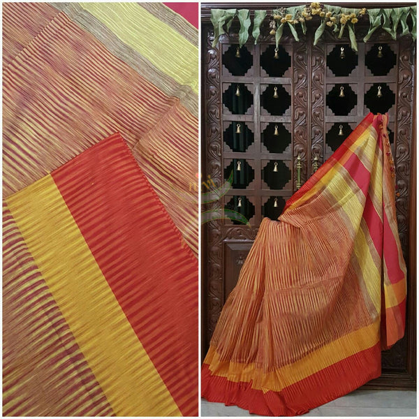 Orange Handloom soft Cotton Ikat with contrasting red yellow pallu and  border.