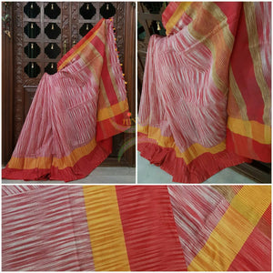 Pink Handloom soft Cotton Ikat with contrasting red yellow pallu and  border.