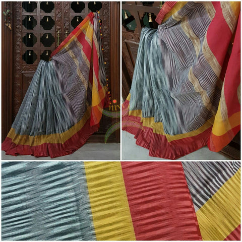 Grey Handloom soft Cotton Ikat with contrasting red yellow pallu and  border.