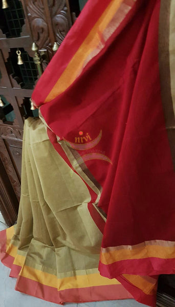 Cream Handloom merserised soft cotton saree with contrast orange peach border. saree comes with maroon pallu and maroon blouse.