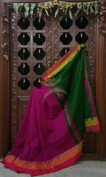 Magenta Handloom merserised soft cotton saree with contrast pink orange border. saree comes with green pallu and green blouse.