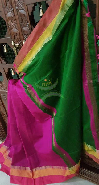 Magenta Handloom merserised soft cotton saree with contrast pink orange border. saree comes with green pallu and green blouse.