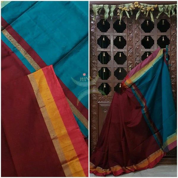 Dark Maroon Handloom merserised soft cotton saree with contrast red orange border. saree comes with teal pallu and teal blouse.