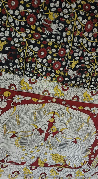 Black and off white chennur silk kalamkari with intricate peacock motif on pallu and floral motif all over the saree.