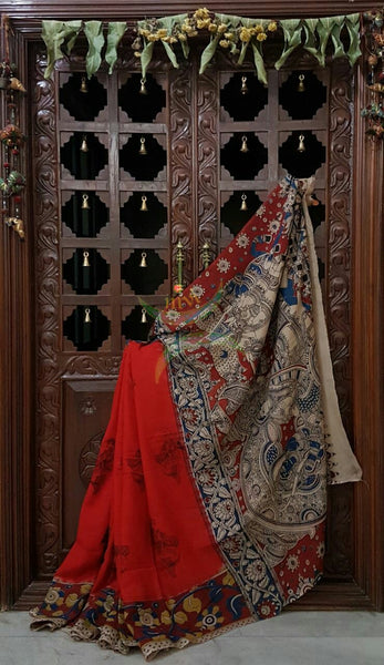 Red chennur silk kalamkari with intricate Radha Krishna motif on pallu floral motif on border and a lady figure all over the saree.