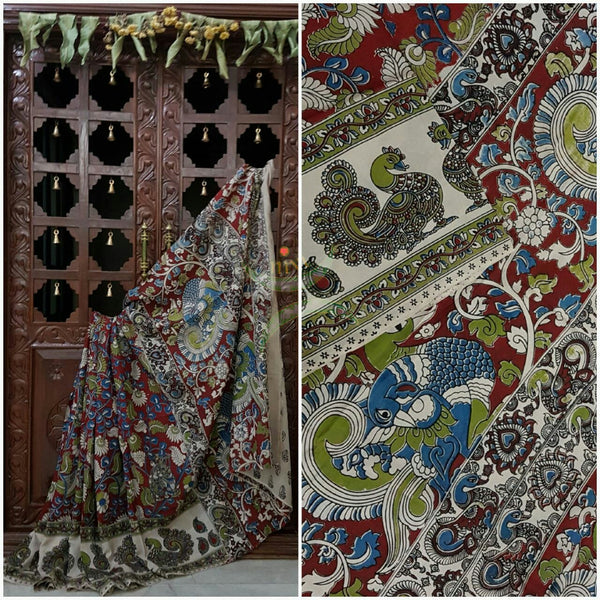 Maroon and off white chennur silk kalamkari with intricate peacock motif on pallu border and floral motif all over the saree.
