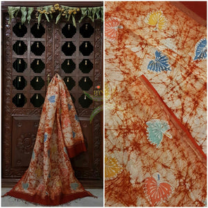 Rust orange Handloom Chanderi Batik duppata with abstract motifs and fine zari border.