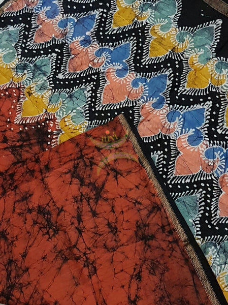 Rust orange and black Handloom Chanderi Batik duppata with abstract motifs and fine zari border.