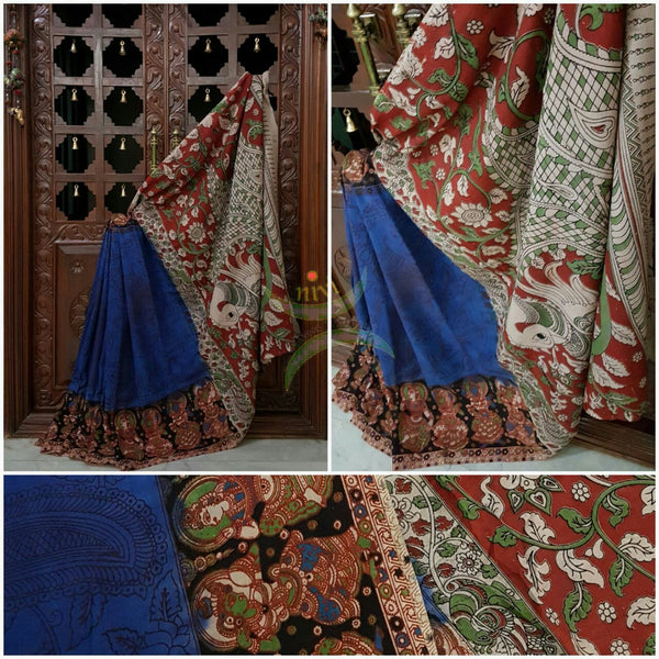 Royal blue mul cotton kalamkari with intricate peacock motif on pallu and body and dancing figure motifs on the border of the saree.