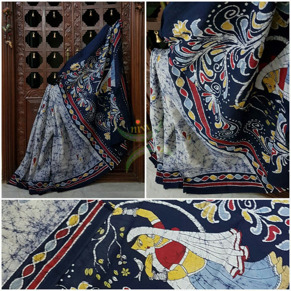 Grey off white handloom Mul Cotton Batik saree with human figure motif on contrasting Navy blue border and pallu