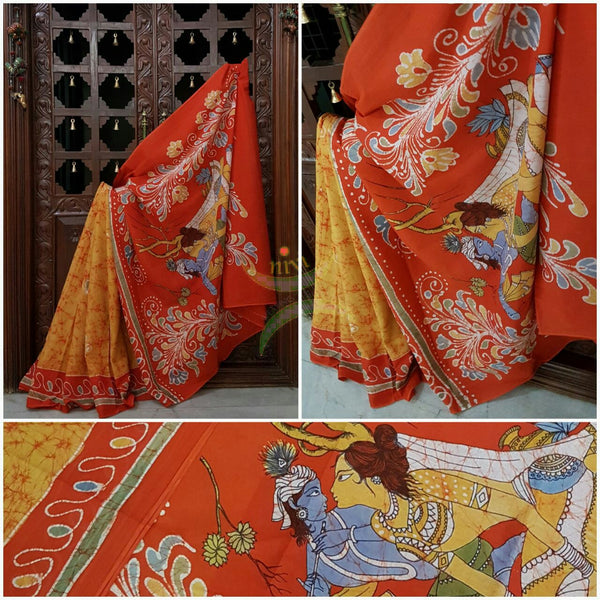 Yellow orange handloom Mul Cotton Batik saree with Radha Krishna motif on contrasting orange border and pallu
