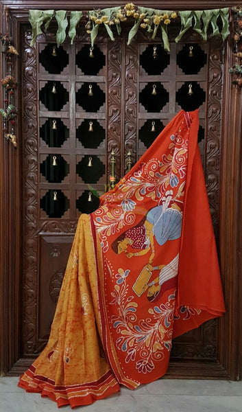 Yellow orange handloom Mul Cotton Batik saree with human figure motif on contrasting orange border and pallu