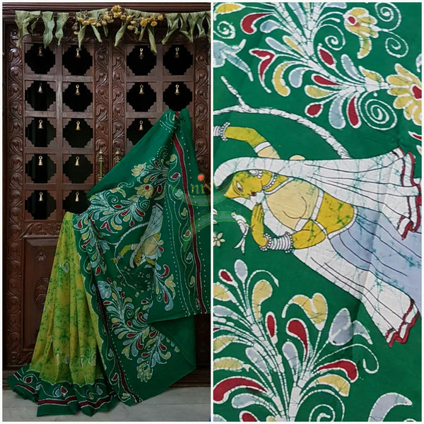 Yellow green handloom Mul Cotton Batik saree with human figure motif on contrasting green border and pallu