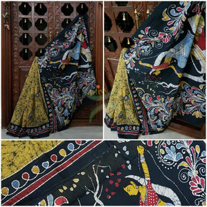 Yellow black handloom Mul Cotton Batik saree with human figure motif on contrasting black border and pallu