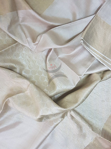 Handwoven tussar silk with gold dew drop motif all over body and pallu.