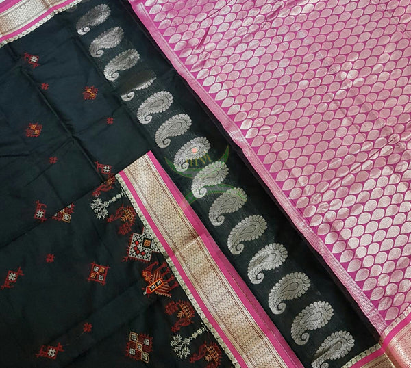 Black with pink kota cotton saree with kasuti embroidery. Saree is woven with Paisley motif and Brocade border and pallu.