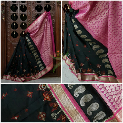 Black with pink kota cotton saree with kasuti embroidery. Saree is woven with Paisley motif and Brocade border and pallu.