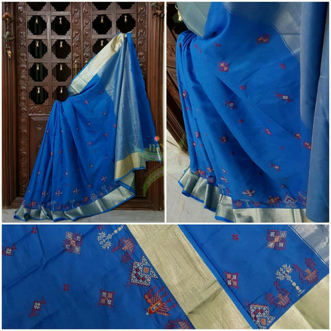 Blue Kota Cotton saree with kasuti embroidery. Saree is woven with tissue border and pallu.