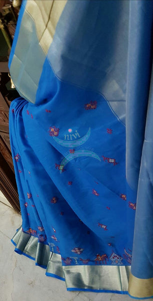 Blue Kota Cotton saree with kasuti embroidery. Saree is woven with tissue border and pallu.