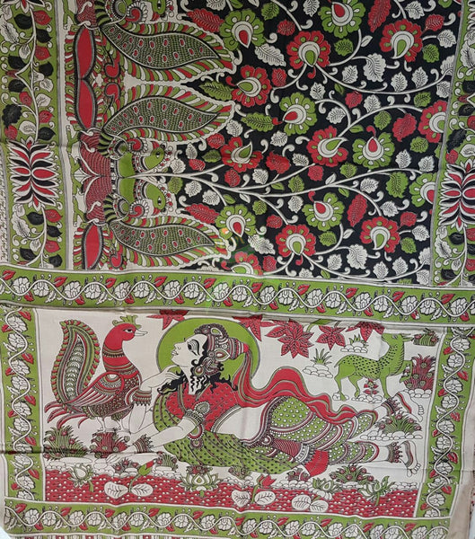 Black mul cotton kalamkari with intricate floral and peacock motif on body of the saree, human figure motif on the pallu and  floral motif on the border.