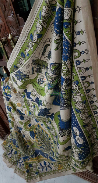 Off white mul cotton kalamkari with intricate floral and peacock motif on body of the saree, human figure motif on the pallu and  floral motif on the border.