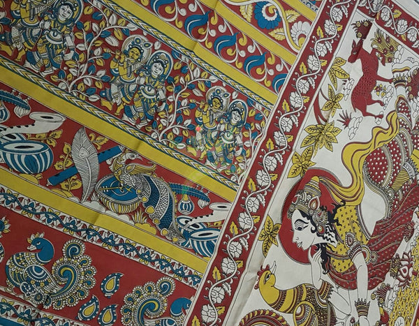 Red mul cotton kalamkari with intricate floral, human figure and peacock motif.