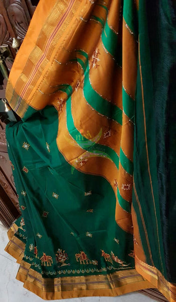 Green silk cotton ilkal with traditional anne ambari motif kasuti embroidery and mustard tope teni pallu