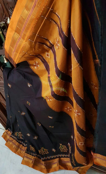 Brown silk cotton ilkal with traditional anne ambari motif kasuti embroidery and mustard tope teni pallu