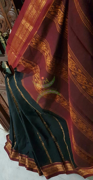 Black with maroon Dharwad mercerized cotton saree with traditionally woven border and pallu.