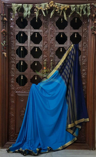 Blue with Navy blue Art silk crepe with woven zari border and pallu.