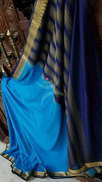 Blue with Navy blue Art silk crepe with woven zari border and pallu.