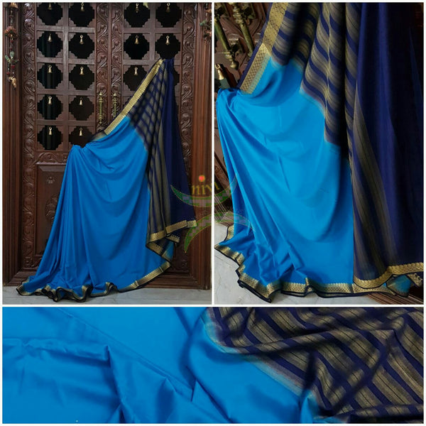 Blue with Navy blue Art silk crepe with woven zari border and pallu.