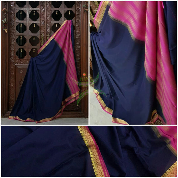 Navy blue with pink Art silk crepe with woven zari border and pallu.
