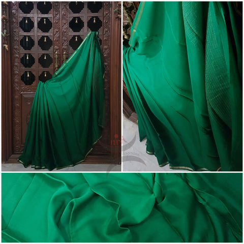 Two tone Bottle green 40 gms pure silk crepe. Saree comes with lighter shade silk crepe blouse piece.