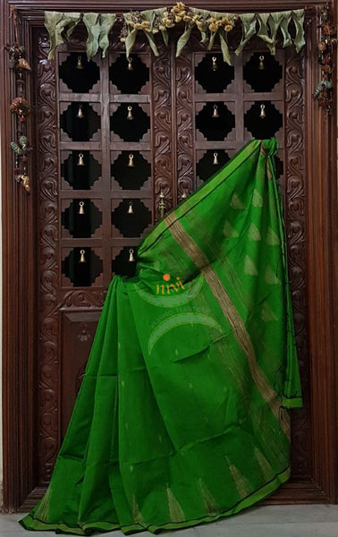 Green Bengal Handloom cotton with woven temple border with Geecha pallu. Saree comes with rinning blouse . 
