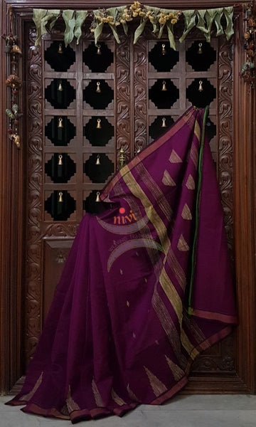 Purple Bengal Handloom cotton with woven temple border with Geecha pallu. Saree comes with running blouse . 