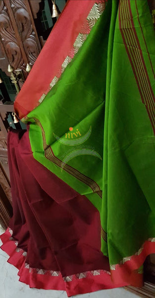 Maroon Handloom merserised soft cotton saree with contrast orange border with woven zari. saree comes with green pallu and blouse.