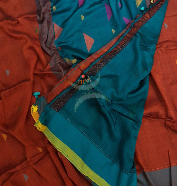 Orange with Teal handloom linen cotton saree with contrasting pallu and border. Saree is woven with booties all over.