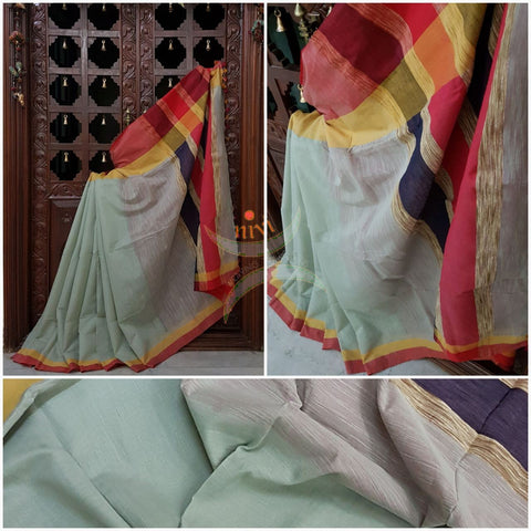 Grey handloom cotton with contrasting red orange border and Geecha pallu