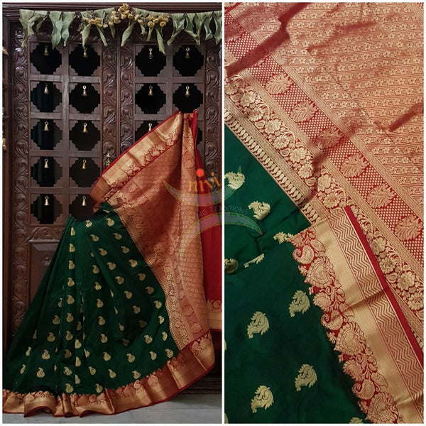 Bottle green with red kanjivaram  pure silk saree woven with floral brocade pattern on pallu, border and floral booties all over.