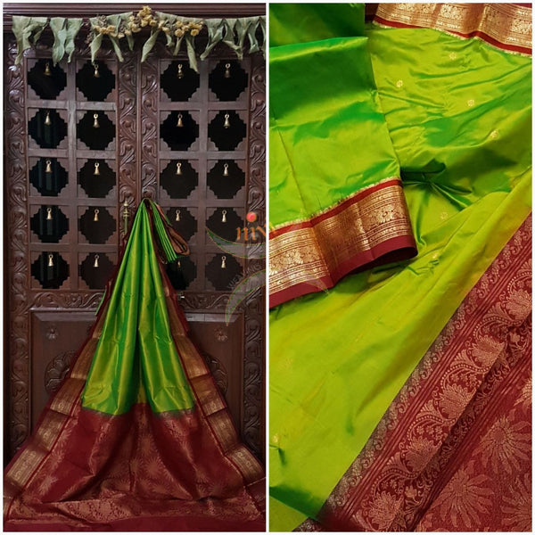 Parrot green with red handloom small Ghatti border pure south silk saree woven with floral brocade pattern on pallu, border and has floral booties all over.