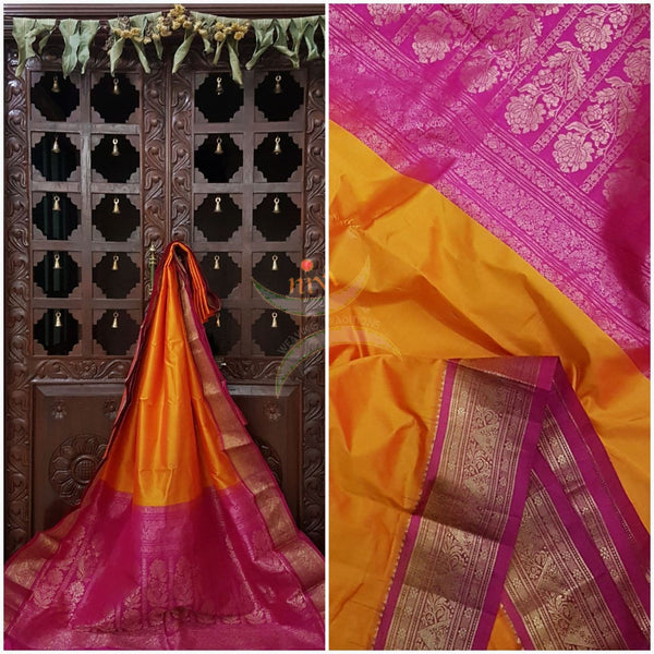 Mustard with pink handloom small Ghatti border pure south silk saree woven with floral brocade pattern on pallu, border and has floral booties all over.