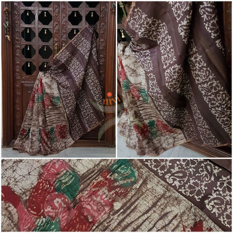 Off white with brown Handloom pure tussar silk with batik print woven with fine zari lines.