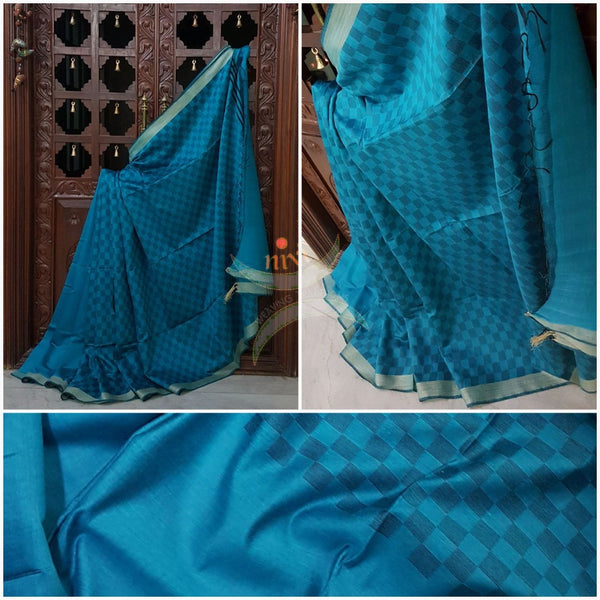 Turquoise blue  half and half Bengal Handloom cotton with woven checks and plain with striped pallu. Saree comes with plain blouse . 